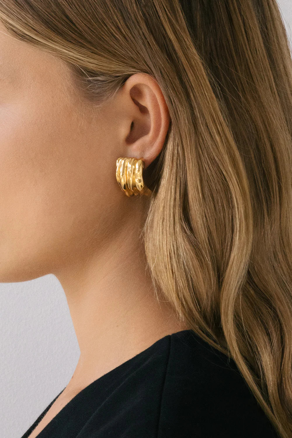 Vertigo Earrings Gold