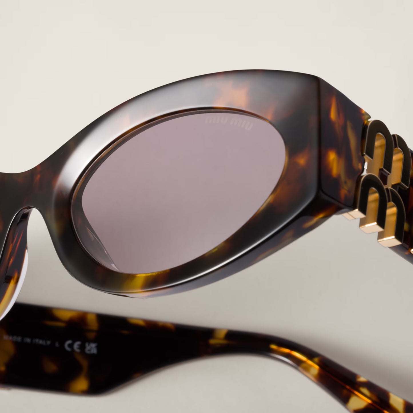 Miu Miu Oval Sunglasses Tortoise 0MU 11WS