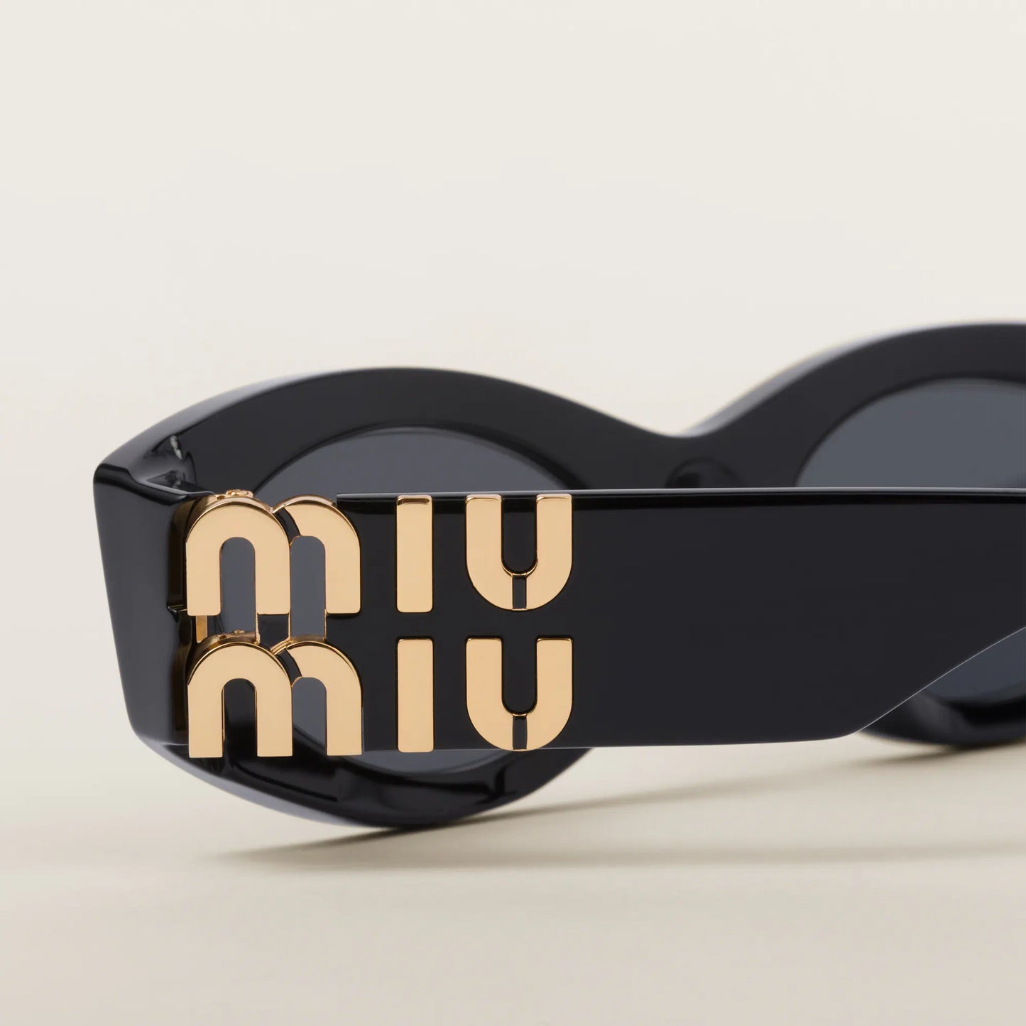 Miu Miu Oval Sunglasses Black 0MU 11WS